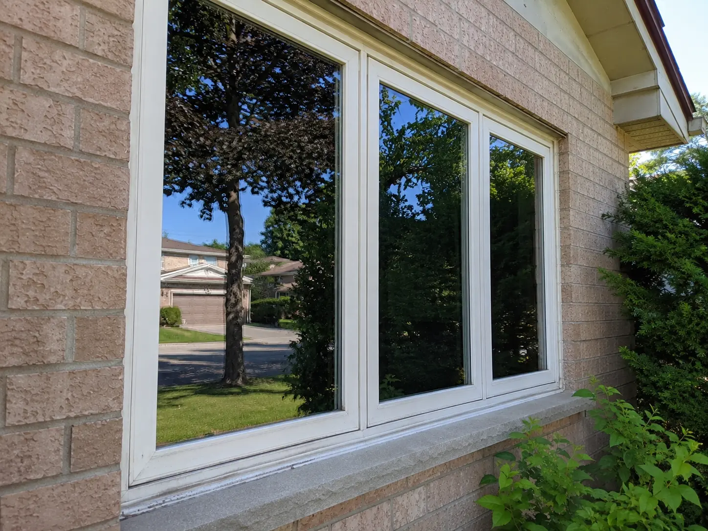 Exterior residential window after cleaning, glass clear