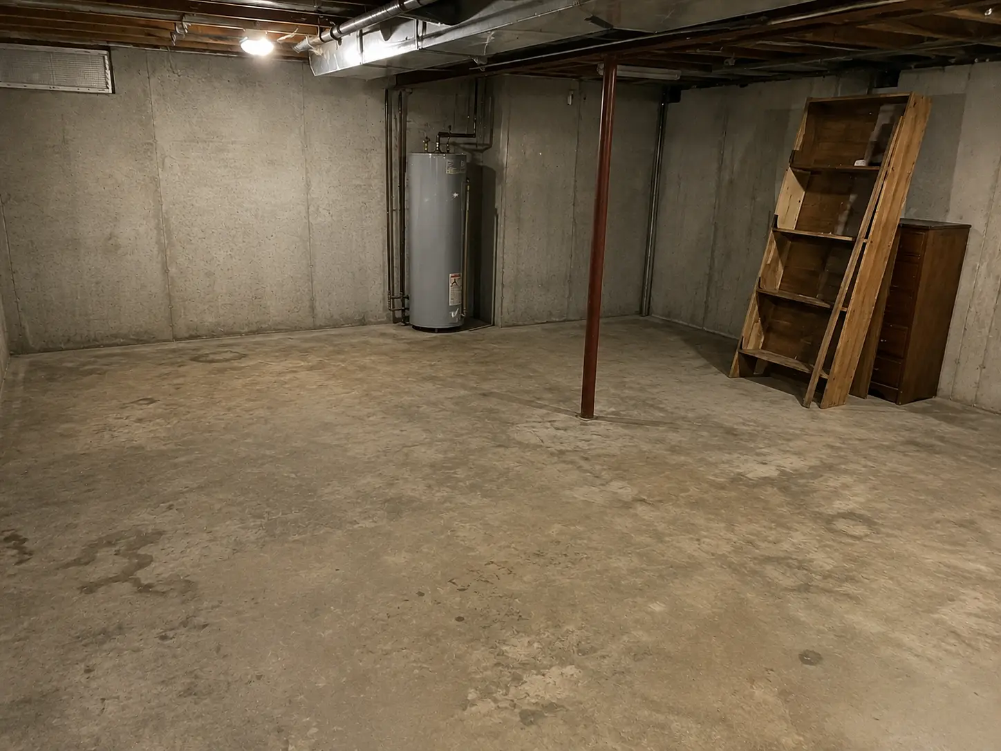 Unfinished basement cleared after junk removal